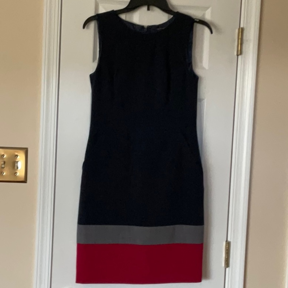 Navy blue sleeveless dress.